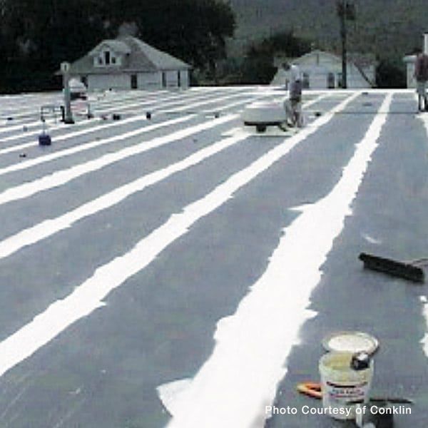 Fabric Reinforced Conklin Roof System Installation